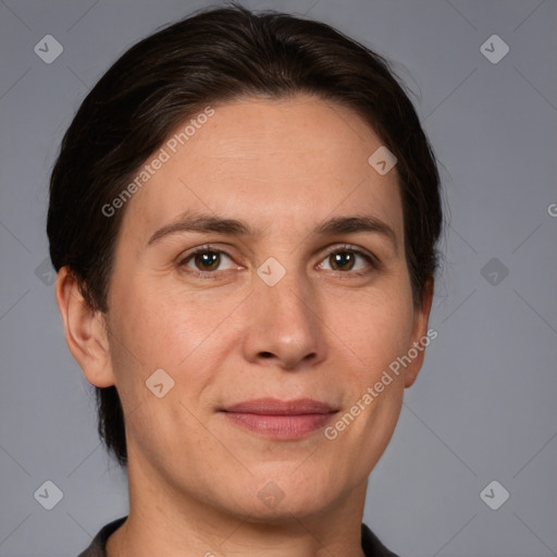 Joyful white adult female with short  brown hair and brown eyes