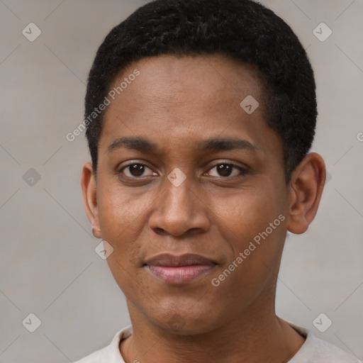 Joyful black young-adult male with short  black hair and brown eyes