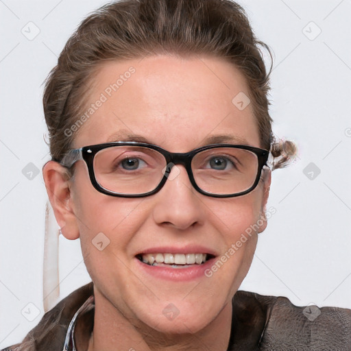 Joyful white young-adult female with short  brown hair and blue eyes