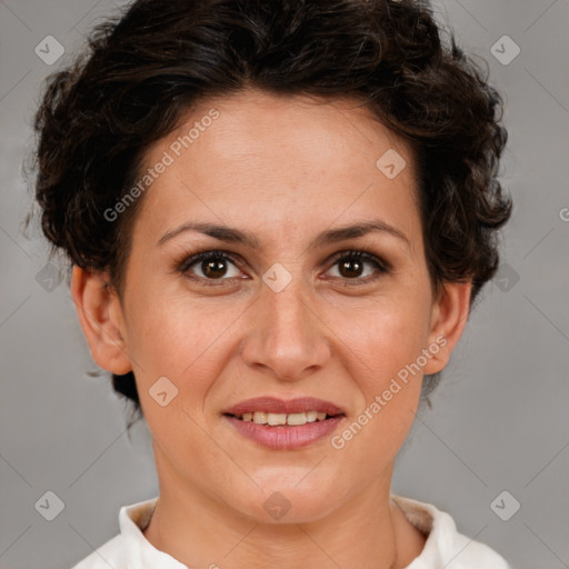 Joyful white adult female with short  brown hair and brown eyes