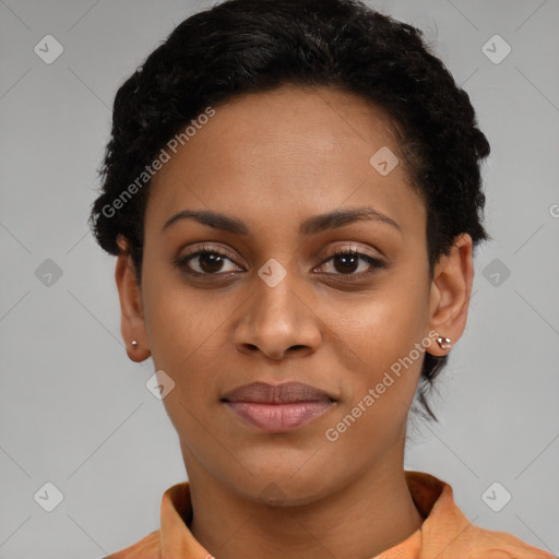 Joyful black young-adult female with short  black hair and brown eyes