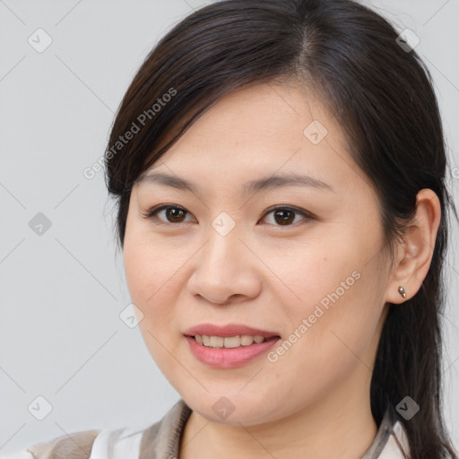 Joyful white young-adult female with medium  brown hair and brown eyes