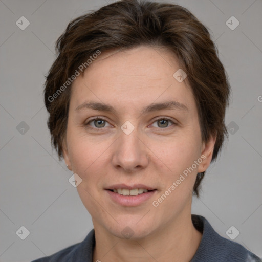 Joyful white adult female with medium  brown hair and grey eyes