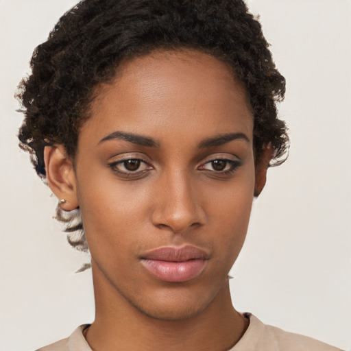 Neutral black young-adult female with short  brown hair and brown eyes