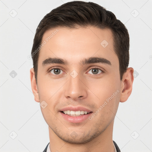 Joyful white young-adult male with short  brown hair and brown eyes