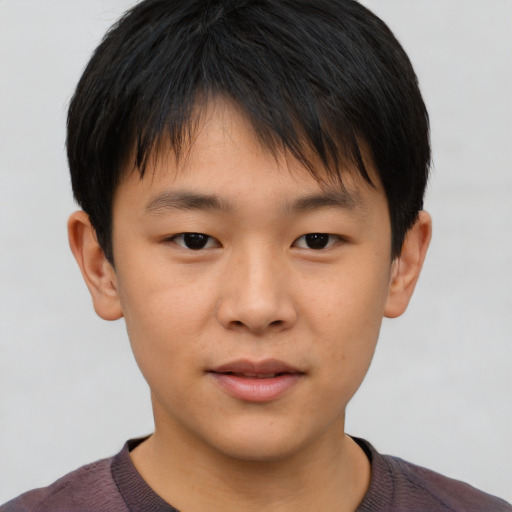 Neutral asian child male with short  brown hair and brown eyes