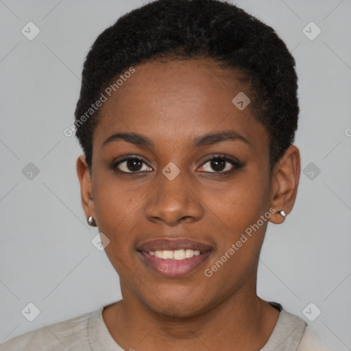 Joyful black young-adult female with short  brown hair and brown eyes