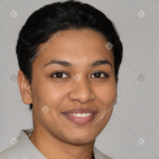 Joyful latino young-adult female with short  brown hair and brown eyes