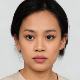 Neutral asian young-adult female with medium  black hair and brown eyes