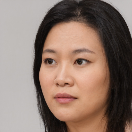 Neutral asian young-adult female with long  black hair and brown eyes