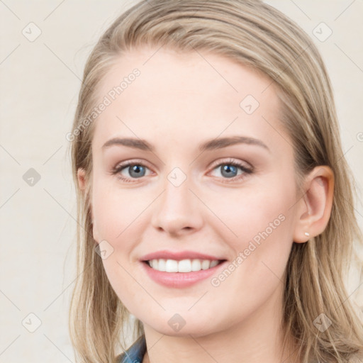 Joyful white young-adult female with medium  brown hair and blue eyes