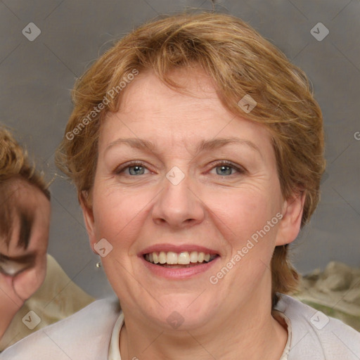 Joyful white adult female with short  brown hair and brown eyes