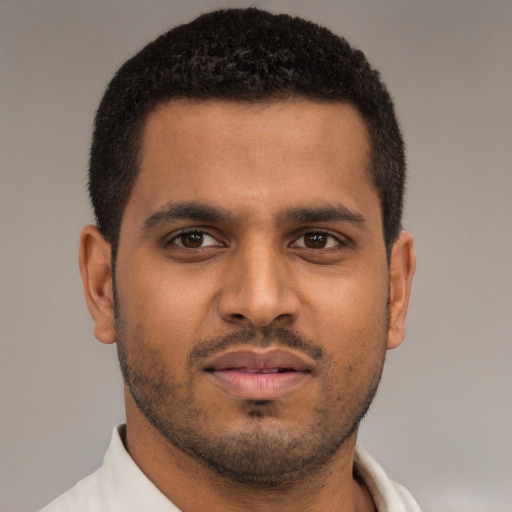 Neutral black young-adult male with short  brown hair and brown eyes
