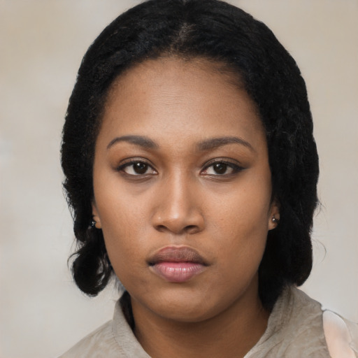 Neutral black young-adult female with long  black hair and brown eyes