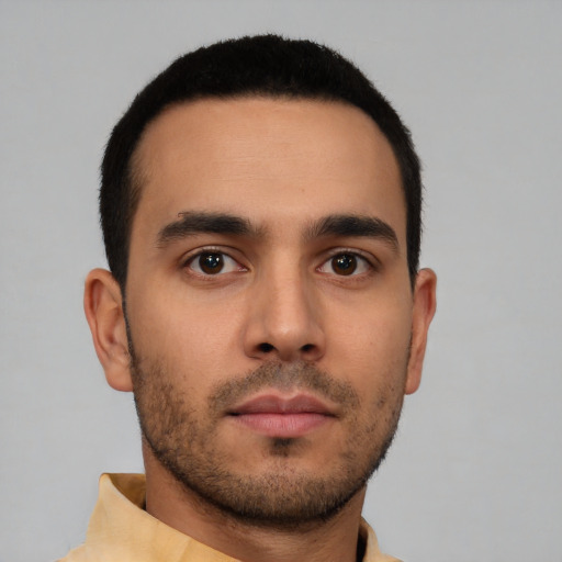 Neutral white young-adult male with short  brown hair and brown eyes