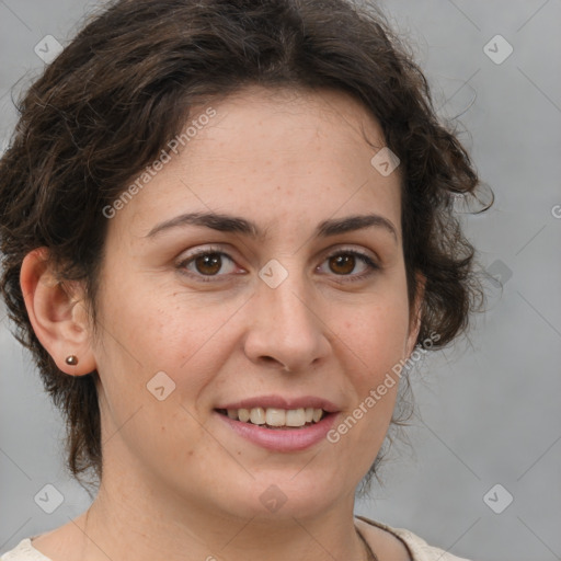 Joyful white adult female with medium  brown hair and brown eyes