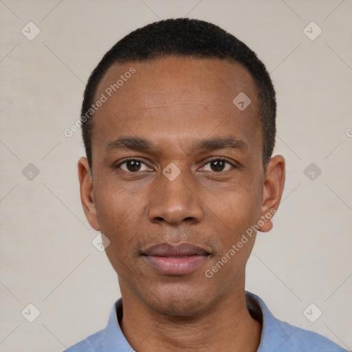Neutral black young-adult male with short  black hair and brown eyes