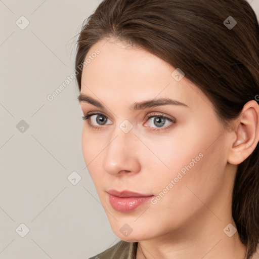 Neutral white young-adult female with medium  brown hair and brown eyes