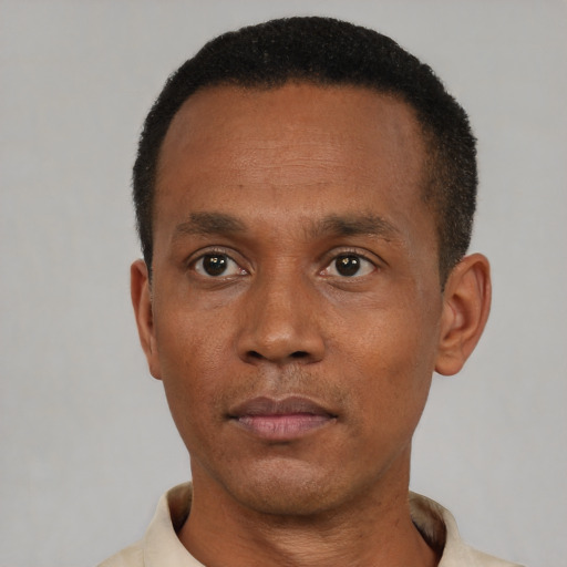 Neutral black adult male with short  black hair and brown eyes