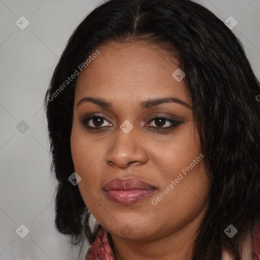 Joyful black young-adult female with long  black hair and brown eyes