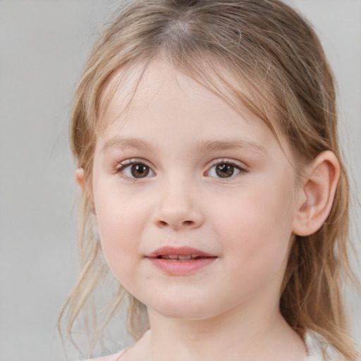 Joyful white child female with medium  brown hair and grey eyes