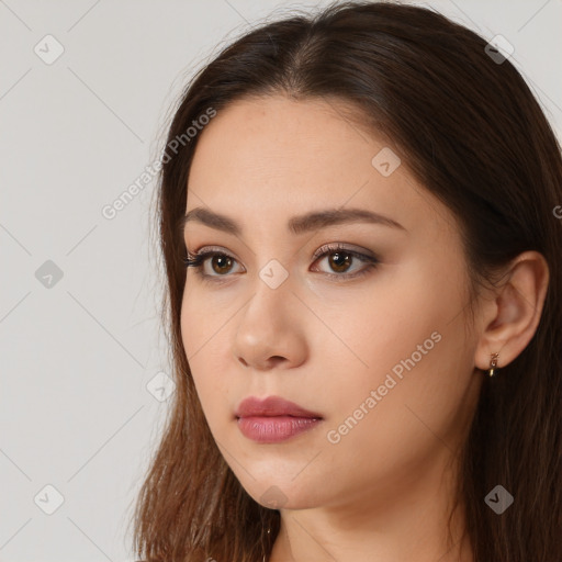 Neutral white young-adult female with long  brown hair and brown eyes