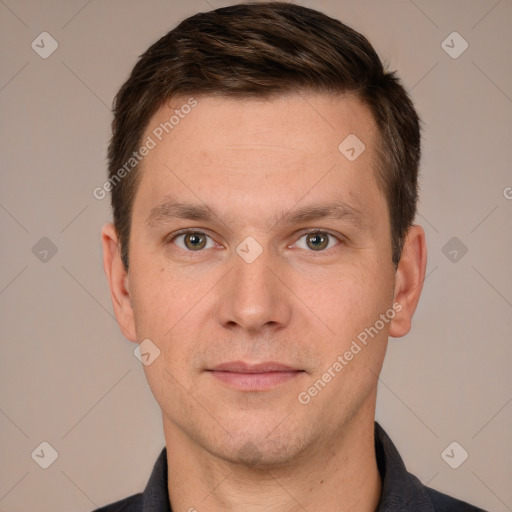 Joyful white adult male with short  brown hair and grey eyes