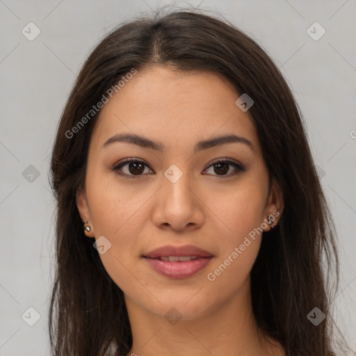 Joyful latino young-adult female with long  brown hair and brown eyes