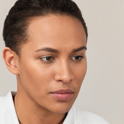 Neutral white young-adult female with short  brown hair and brown eyes