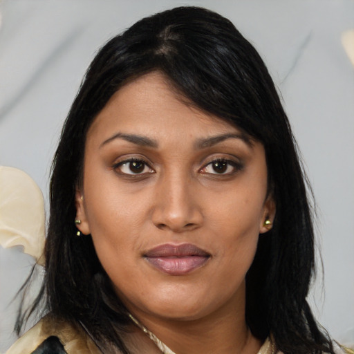 Joyful asian young-adult female with medium  brown hair and brown eyes