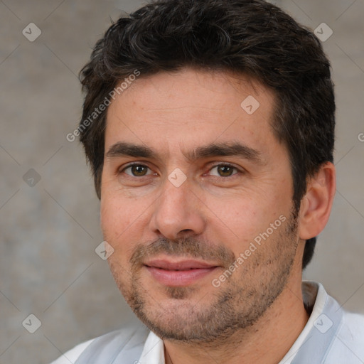 Joyful white adult male with short  brown hair and brown eyes