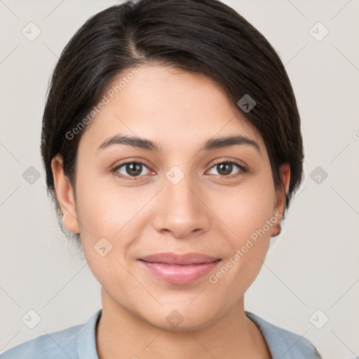 Joyful white young-adult female with short  brown hair and brown eyes