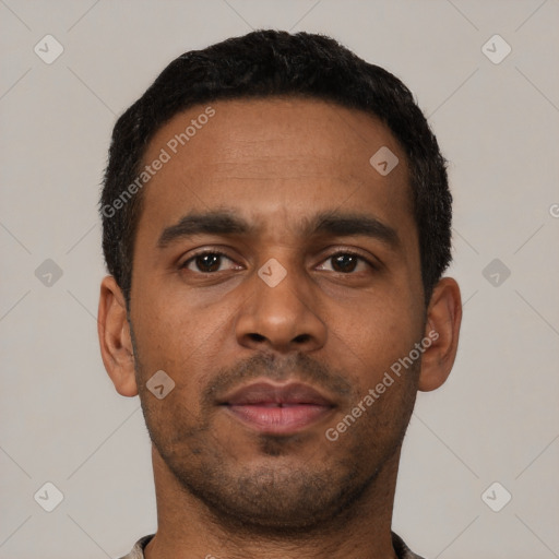 Neutral latino young-adult male with short  black hair and brown eyes