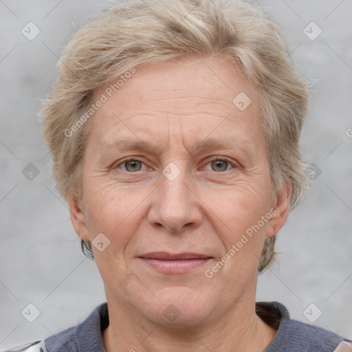 Joyful white middle-aged female with medium  brown hair and grey eyes