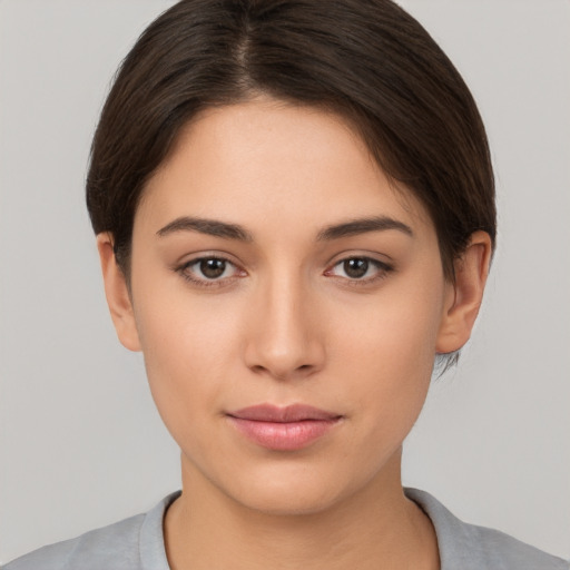 Neutral white young-adult female with short  brown hair and brown eyes