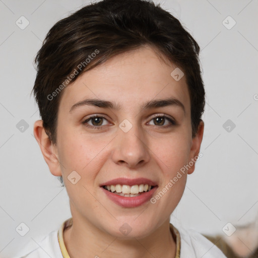 Joyful white young-adult female with short  brown hair and grey eyes