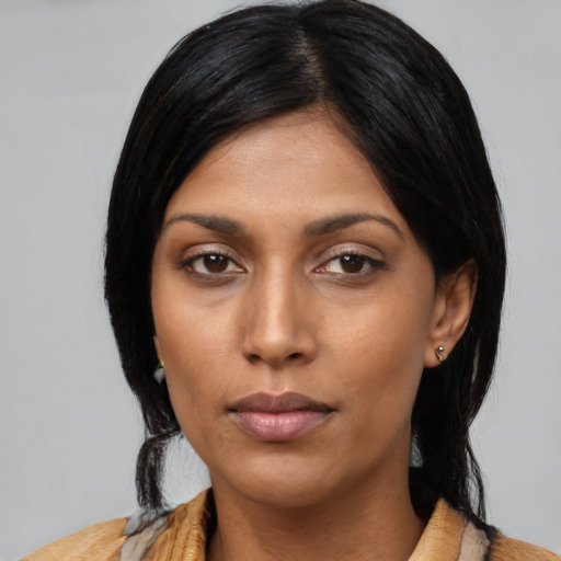 Neutral asian young-adult female with medium  black hair and brown eyes