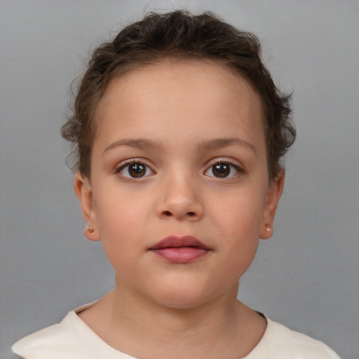 Neutral white child female with short  brown hair and brown eyes