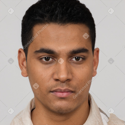 Neutral latino young-adult male with short  black hair and brown eyes