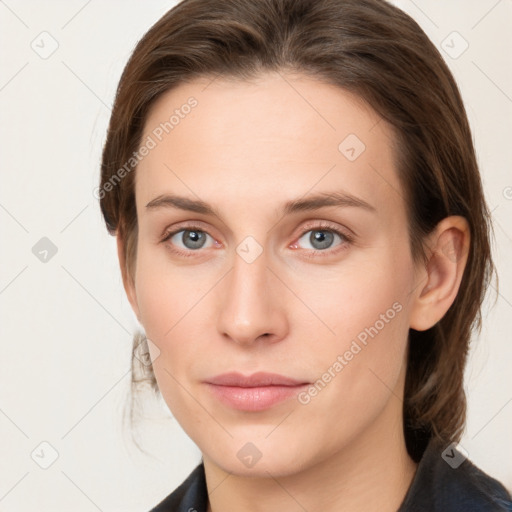 Neutral white young-adult female with medium  brown hair and grey eyes