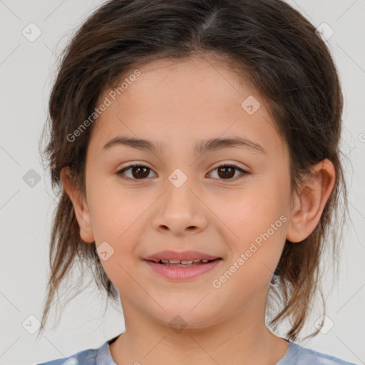 Joyful white child female with medium  brown hair and brown eyes