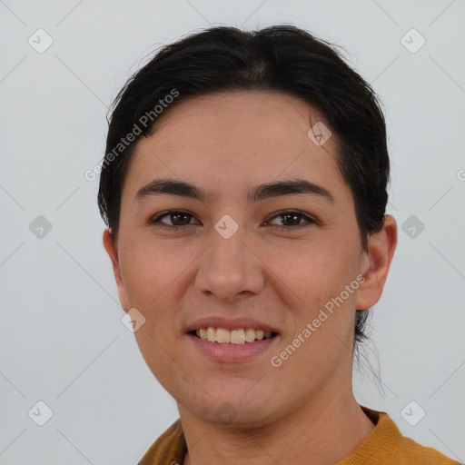 Joyful asian young-adult female with short  brown hair and brown eyes