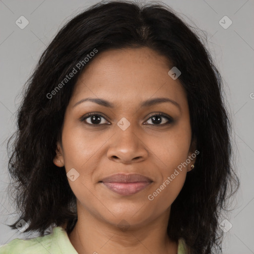 Joyful black young-adult female with medium  brown hair and brown eyes