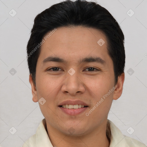 Joyful white young-adult male with short  black hair and brown eyes