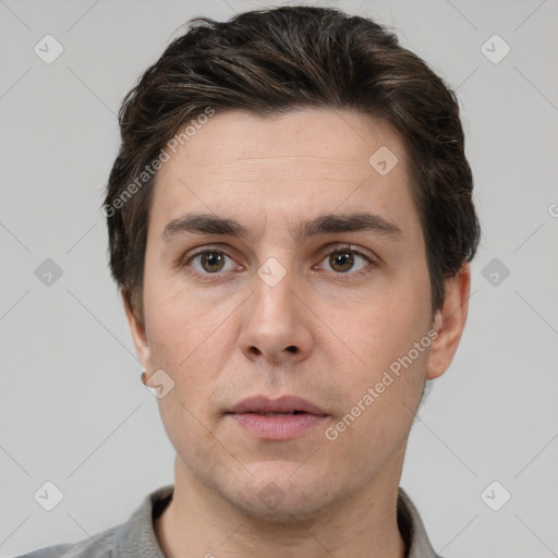 Neutral white young-adult male with short  brown hair and brown eyes