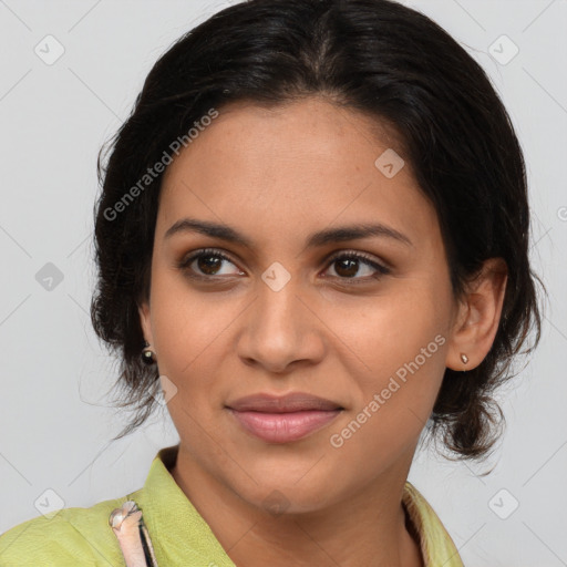 Joyful latino young-adult female with medium  brown hair and brown eyes