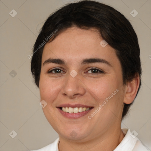 Joyful white young-adult female with short  brown hair and brown eyes