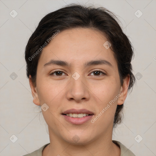 Joyful asian young-adult female with medium  brown hair and brown eyes