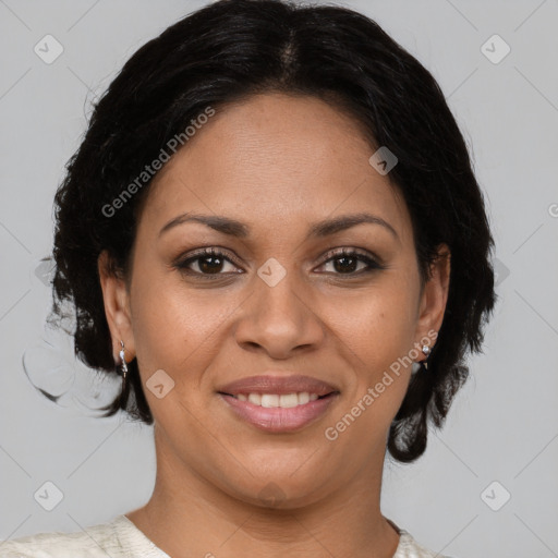 Joyful latino adult female with medium  brown hair and brown eyes