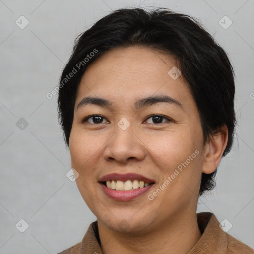 Joyful asian young-adult female with medium  brown hair and brown eyes